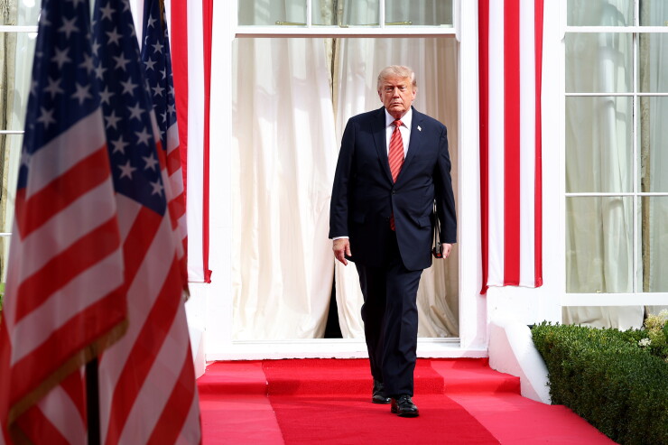 Trump backs Warsh, faults 'hostile' Fed board for rate hike